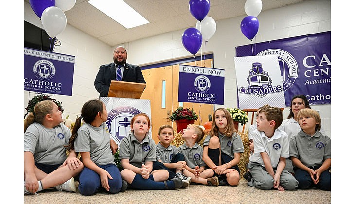 Diocesan Chancellor Giovanni Virgiglio speaks during a ceremony to officially open Catholic Central School on Sept. 15 in Latham.    Cindy Schultz photo for The Evangelist