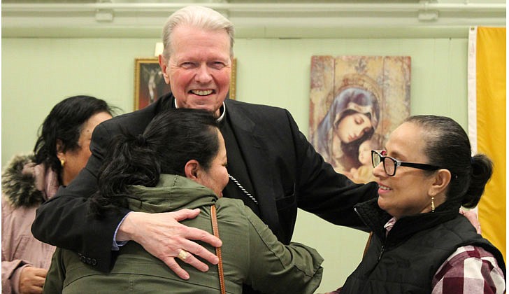 Bishop Edward B. Scharfenberger is all smiles as he poses with participants during the first Diocesan Synod Listening Session, which took place on April 20 at Holy Trinity Church in Johnstown.  Molly Halpin photo