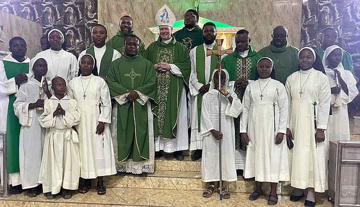 On his mission trip to Nigeria from Feb. 8-16, Bishop Edward B. Scharfenberger, who was accompanied by Father Charles Onyeneke, parochial vicar at Blessed Sacrament Parish in Albany, got to meet the people of the Archdiocese of Lagos, celebrated Mass and met with potential seminarians who could eventually make their way to the Diocese of Albany.  Bishop stayed in the Parish of St. Charles Borromeo, Victoria Island, Lagos, the entire time. Some highlights included: Meeting with Archbishop Alfred Martins in his residence at the Cathedral in Lagos on Feb. 10; visiting the Church of St. Mary in Ajegunle on Feb. 12 and saying Mass there; blessing the new Stella Maris rectory after Mass and having dinner with several priests and nuns; and meeting Father Philip Uchdendu, former secretary to the Archbishop of Lagos and current pastor of the parish of St. Peter Claver in Ajah, near the airport on Feb. 16.  The best thing about the journey is that it did not cost the Diocese a single penny. Father Onyeneke’s plane ticket was paid for with redeemed airline miles from Father Thomas Hoar, SSE, the diocesan director of Vocations and Formation, and Bishop’s expenses will be reimbursed by the Pontifical Mission Societies after the people of Nigeria asked him to visit.  Bishop Scharfenberger poses with the faithful after Mass at the seaside parish of Our Lady Star of the Sea in Ajah-Lekki. 