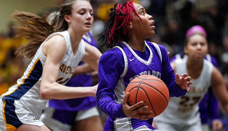 The Catholic Central girls’ basketball team lost to Averill Park, 61-49, in the Section II Class A championship at Hudson Valley Community College on March 3.  Sophomore Tanavia Turpin had a team-high 12 points for the Crusaders (19-3) and teammate El' Dior Dobere, an eighth-grader, added 11 points as both players made the all-tournament team. The rest of the team is made up of sophomore Meg Paul, senior Samantha Ayotte, freshman Gabriella DiBacco, senior Angelena Guiliano, freshman Akarri Gaddy and sophomore Brooklyn Moore.   In the photo: Dobere takes the ball to the basket.   Cindy Schultz photos for The Evangelist. 