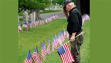 Help honor vets by placing flags on graves