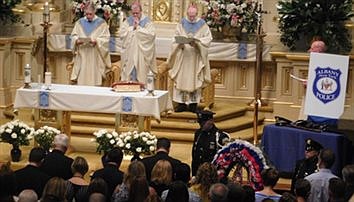 Police memorial Mass includes dedication of ‘Father Lefebvre Way’