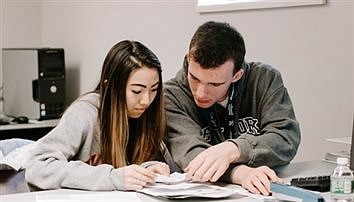 Catholic Central students help prepare taxes in volunteer program