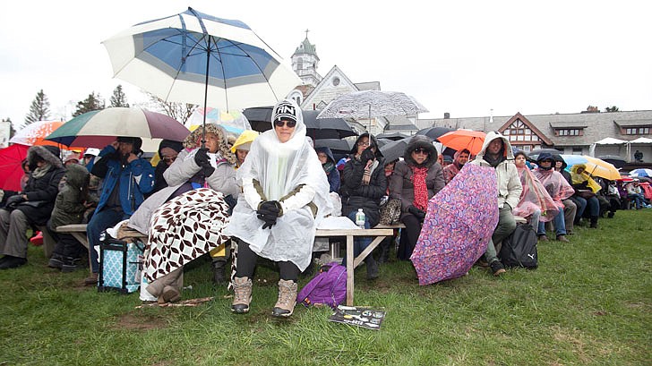 Thousands braved the rain and cold temperatures to attend Mass on Divine Mercy Sunday at the National Shrine of Divine Mercy in Stockbridge, Mass., on Sunday, April 28. Bishop Edward Scharfenberger celebrated the Mass, blesses the crowd with the heart of St. Jean Vianney, the patron saint of parish priests, and gives out communion along with other priests. Divine Mercy is based on St. Faustina Kowalska’s visions and conversations she had with Jesus Christ, who asked St. Faustina to paint the vision of Divine Mercy. Divine Mercy Sunday is the first Sunday after Easter. (Nate Whitchurch photos)