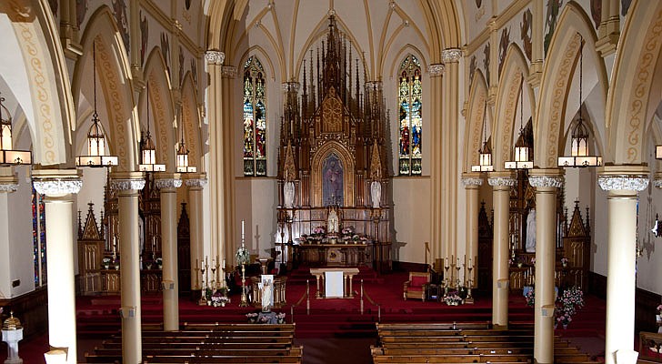 The Church of St. Adalbert is located on 550 Lansing Street in Schenectady and has been a haven for Polish people and their cultures and traditions for 116 years. In fact, the church still has a Mass in Polish every Sunday at 9 a.m., as well as confessions in English and Polish on Saturday. The book for the 75th anniversary of the church, begins, “Crested on a hill stands the Church of St. Adalbert, its magnificent steeple spiralling heavenward, a reminder of the Shrine of Our Lady of Czestochowa (Jasna Gora), the spiritual and focal point of Poland. Thus located, it offers panoramic views of the City  of Schenectady.” St. Adalbert was the sixth Roman Catholic Church in Schenectady when the original church was built in 1903, and the name was chosen because St. Adalbert was a Bohemian Missionary Bishop and friend of Prince Boleslaw the Brave of Poland. St. Adalbert was killed by pagan priests on April 23, 997 doing missionary work in East Prussia. The school, church and rectory were all built within seven months and were valued at $33,000. The original church burned in 1909 and the construction of the present church started in 1910 at a cost of $45,000. The parish mission statement is: “As members of the Church of Saint Adalbert, we strive to be a loving, vibrant Roman Catholic community, dedicated to being Church for one another and supportive, helpful, and caring to all. As we nurture our Polish Catholic heritage, we endeavor to be a community that welcomes everyone.”  Source: Church of St. Adalbert Jubilee book and church bulletin  All photos by Nate Whitchurch