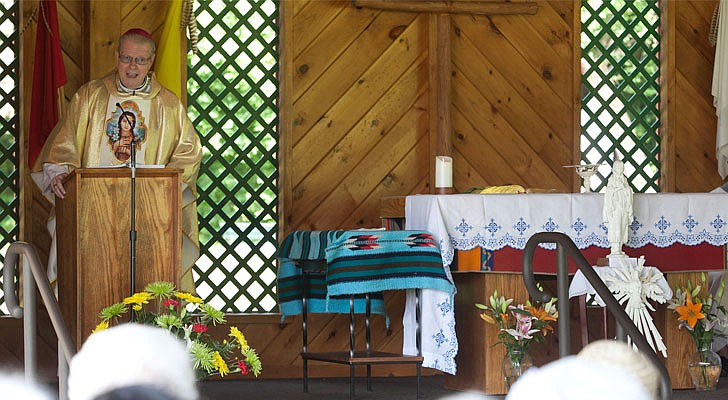 It was Saint Kateri Tekakwitha Feast Day weekend at the Saint Kateri Tekakwitha National Shrine and Historic Site in Fonda on July 13-14. Bishop Edward B. Scharfenberger celebrated Mass on Sunday along with Father James McCurry, OFM, and Father Tim Lyons. The Mass featured a smudging ritual and Four Direction Purification Ceremony.  Bishop Scharfenberger delivers his homily.  Photos by Nate Whitchurch. 