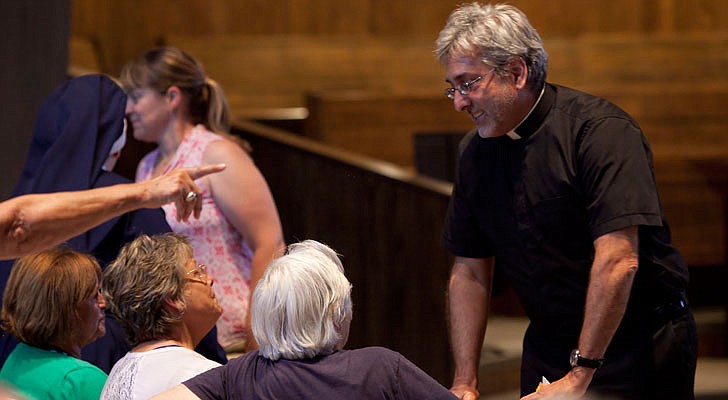 The 2019 Concert for Vocations was held on Tuesday, Aug. 6, at St. Pius X Church in Loudonville. The evening started with a holy hour and benediction from Bishop Edward B. Scharfenberger and was followed by a concert by the priests, seminarians, deacons and religious of the Diocese of Albany.   Photo: Father Paul Catena chats with Frances Wellington and Joanna Corrad.  Photos by Nate Whitchurch