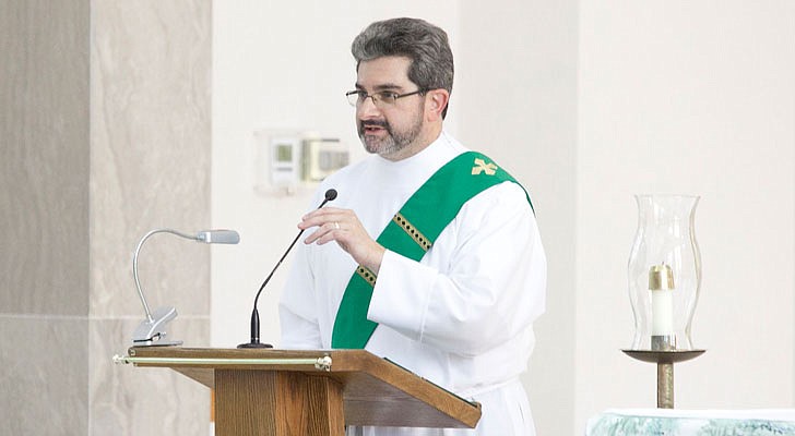 Future deacons celebrated the Rite of Admission to Candidacy for Holy Orders on Sunday,  Sept. 15, in a ceremony held at St. Joseph’s Chapel at St. Joseph's Provincial House in Latham with Bishop Edward B. Scharfenberger presiding. In this rite, candidates offer themselves to God and the Church, an official recognition of a vocation. Candidates and their wives, if they're married, attend a retreat before the ceremony.   Deacon Paul Kisselback welcomes visitors before the Mass.  Photos by Nate Whitchurch