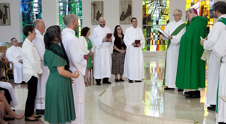 Future deacons celebrated the Rite of Admission to Candidacy for Holy Orders on Sunday,  Sept. 15, in a ceremony held at St. Joseph’s Chapel at St. Joseph's Provincial House in Latham with Bishop Edward B. Scharfenberger presiding. In this rite, candidates offer themselves to God and the Church, an official recognition of a vocation. Candidates and their wives, if they're married, attend a retreat before the ceremony.   Bishop Scharfenberger with candidates James Agnew, from left to right, Craig Dempsey, Thomas Poznanski and Gregg Wilbur before accepting them into the ministry of lector.  Photos by Nate Whitchurch