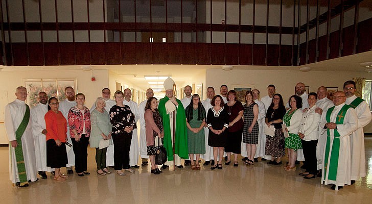 Future deacons celebrated the Rite of Admission to Candidacy for Holy Orders on Sunday,  Sept. 15, in a ceremony held at St. Joseph’s Chapel at St. Joseph's Provincial House in Latham with Bishop Edward B. Scharfenberger presiding. In this rite, candidates offer themselves to God and the Church, an official recognition of a vocation. Candidates and their wives, if they're married, attend a retreat before the ceremony.   Bishop Edward Scharfenberger poses for a photo with the newly installed lectors and acolytes.  Photos by Nate Whitchurch